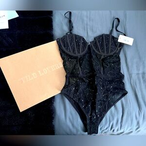 Sparkling bustier body suit. Beautiful to wear under a blouse or by itself.